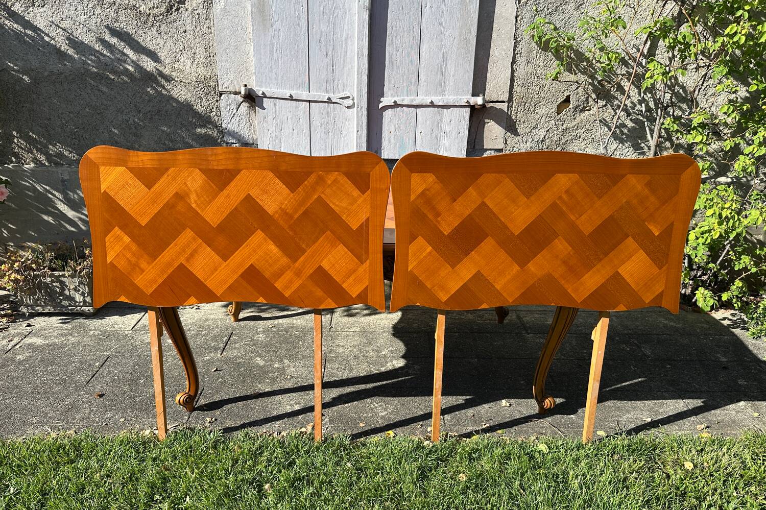 Antique extendable table in cherry wood and marquetry in the Louis XV style.