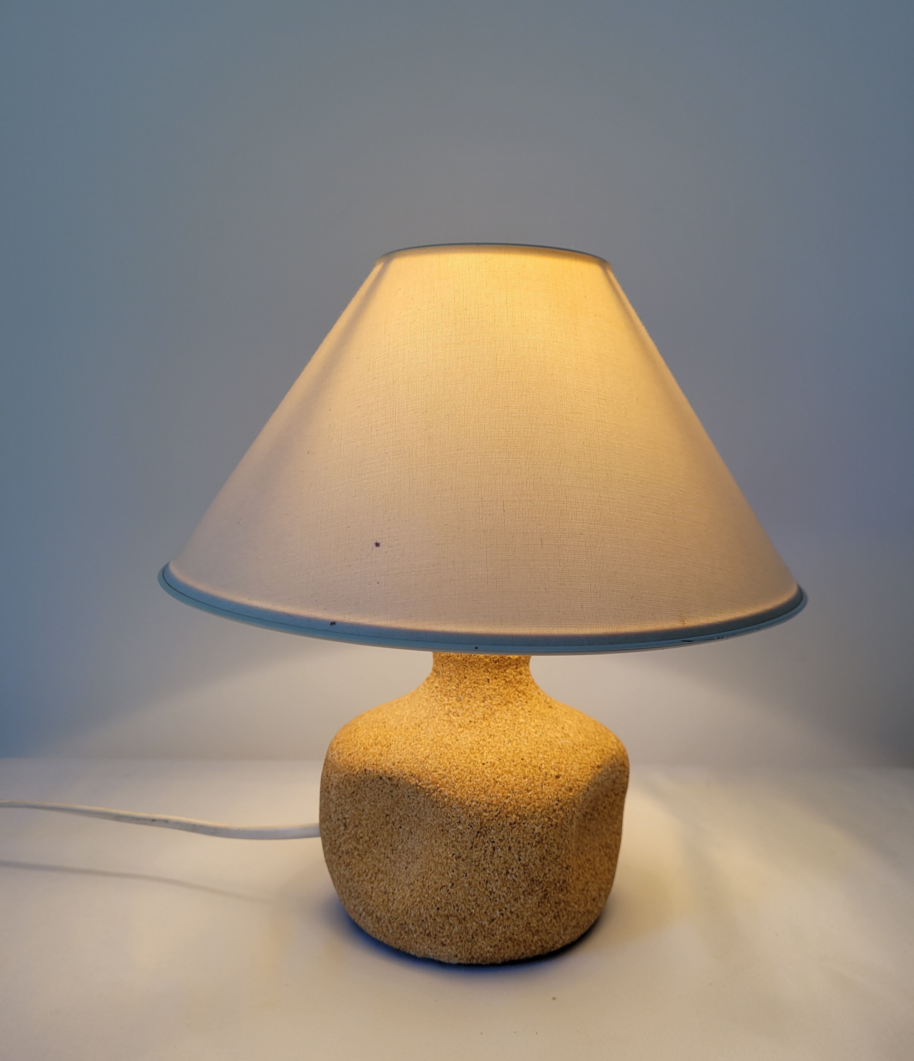 Reconstituted stone bedside lamp