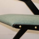 Vintage armchair from the 1960s in black wood and fabric.