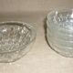 Lot salad bowl and 4 cups in pressed molded glass