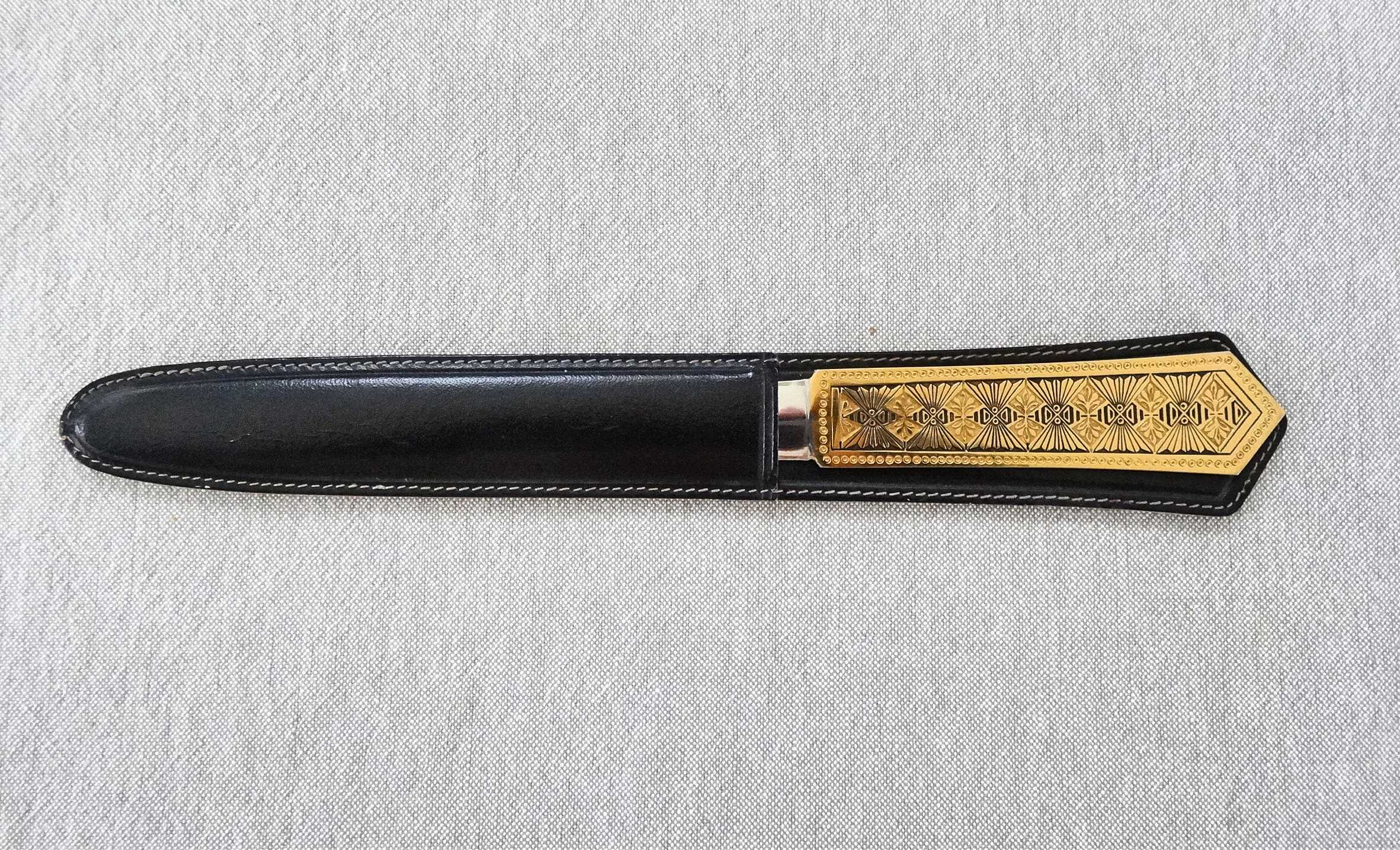 Metal paper cut in its case 1950