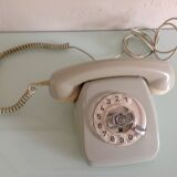Vintage gray and beige rotary phone