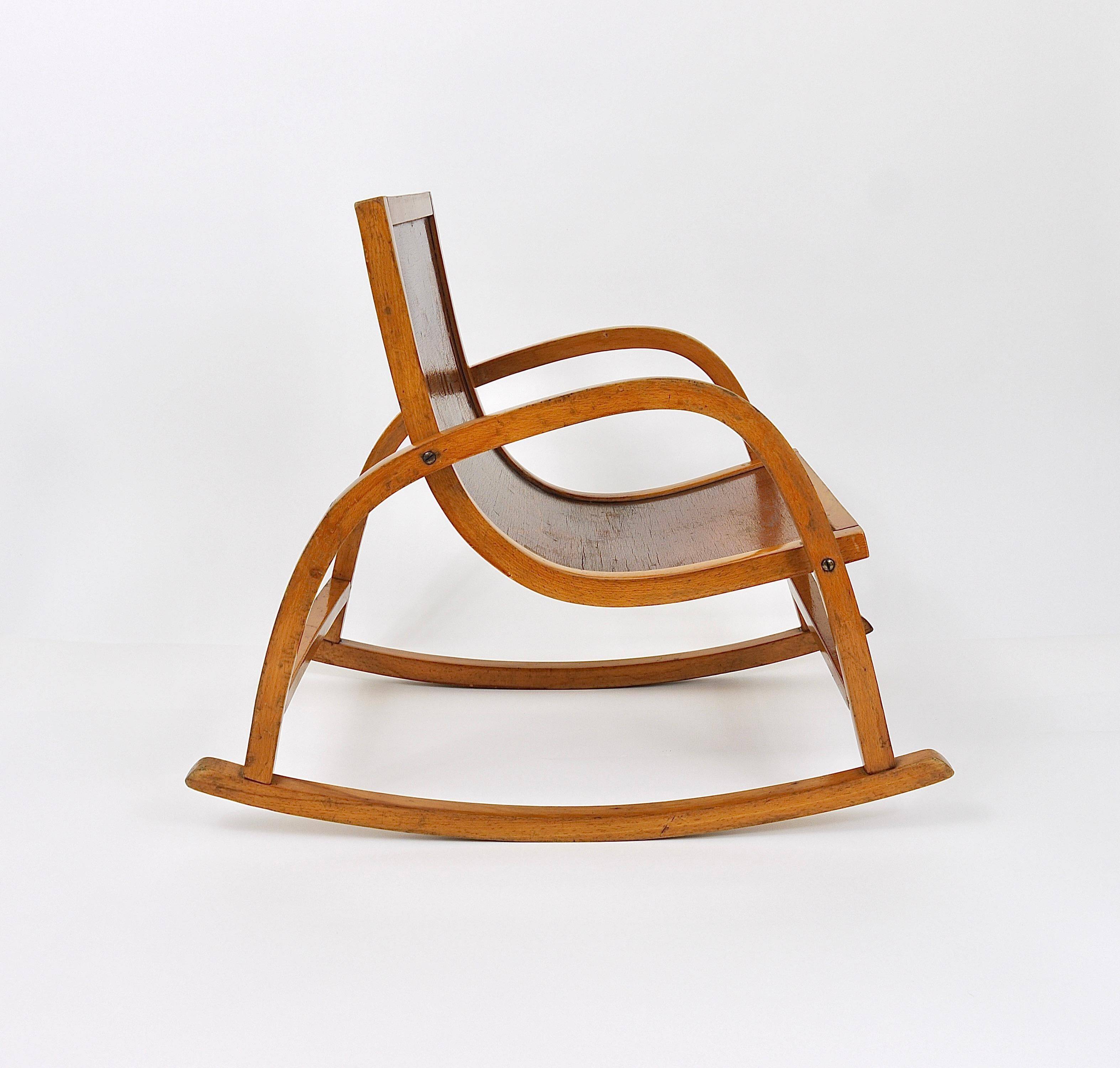 Curved wooden rocking chair for children Bauhaus Brockhage Andrä period, Germany, 1950s