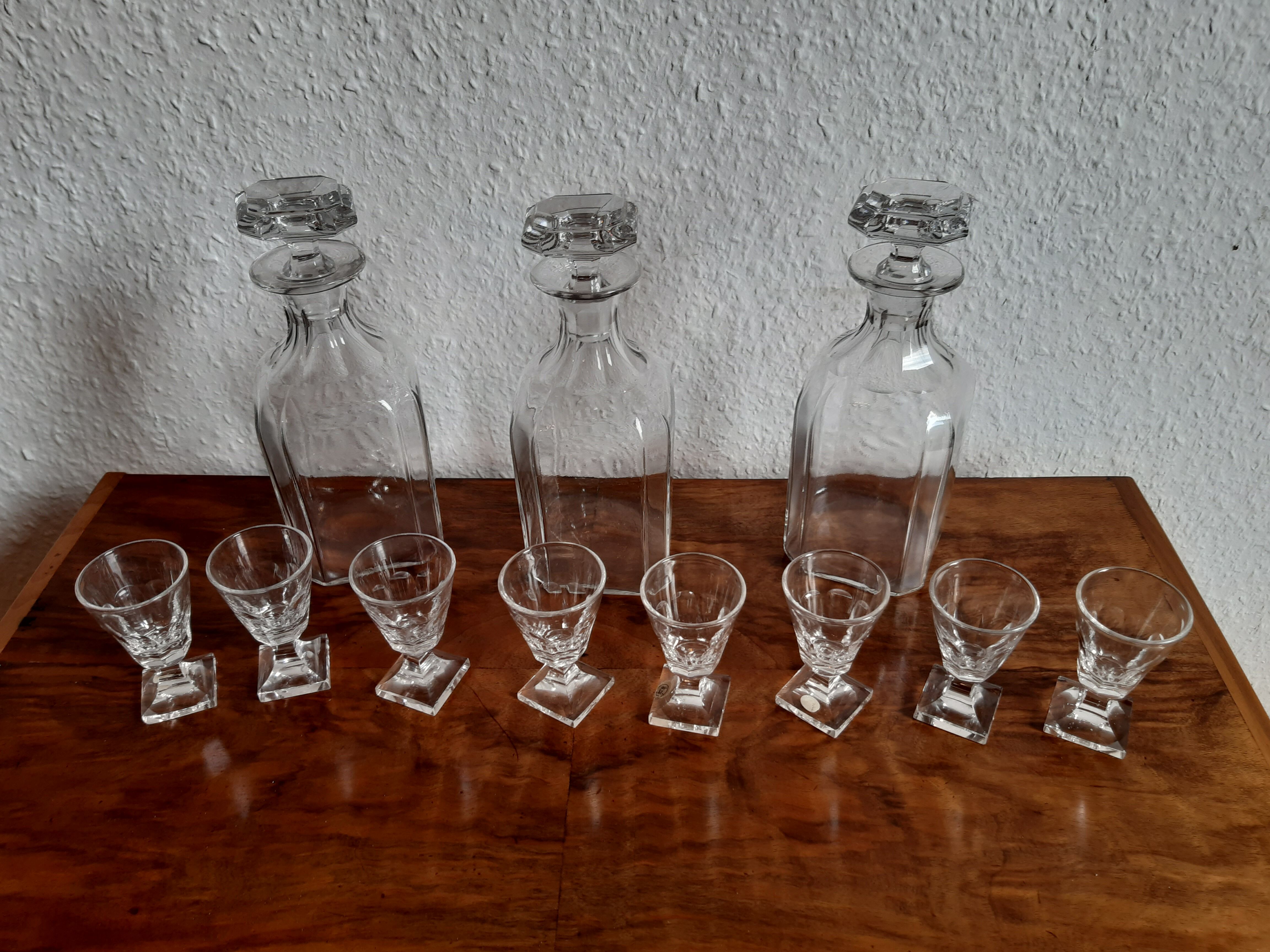 Old-fashioned glass liquor cellar and St Louis crystal decanters
