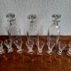 Old-fashioned glass liquor cellar and St Louis crystal decanters