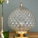 Vintage globe table lamp in moulded glass with diamond points.