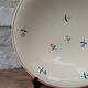 Round serving dish Moulin des Loups Orchies with small flower decoration 25.5cm