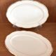 Service of 53 pieces of plates and dishes by Villeroy & Boch in cream and gold, model Saar.