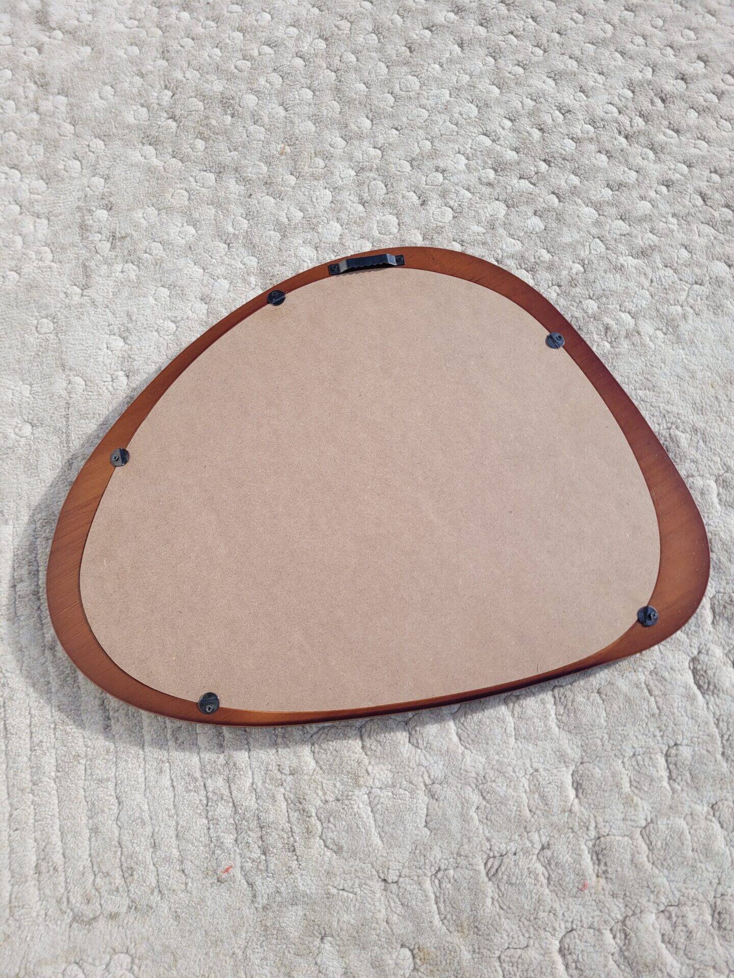 Contemporary oval mirror in teak finish
