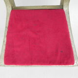 Dining chair upholstered with stamped tin