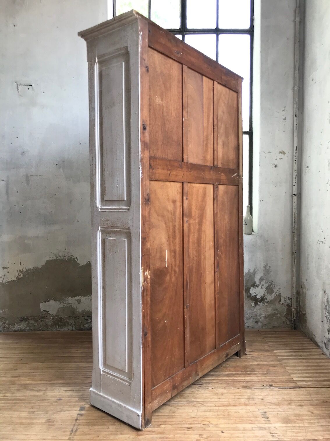 Antique wardrobe in patinated pine