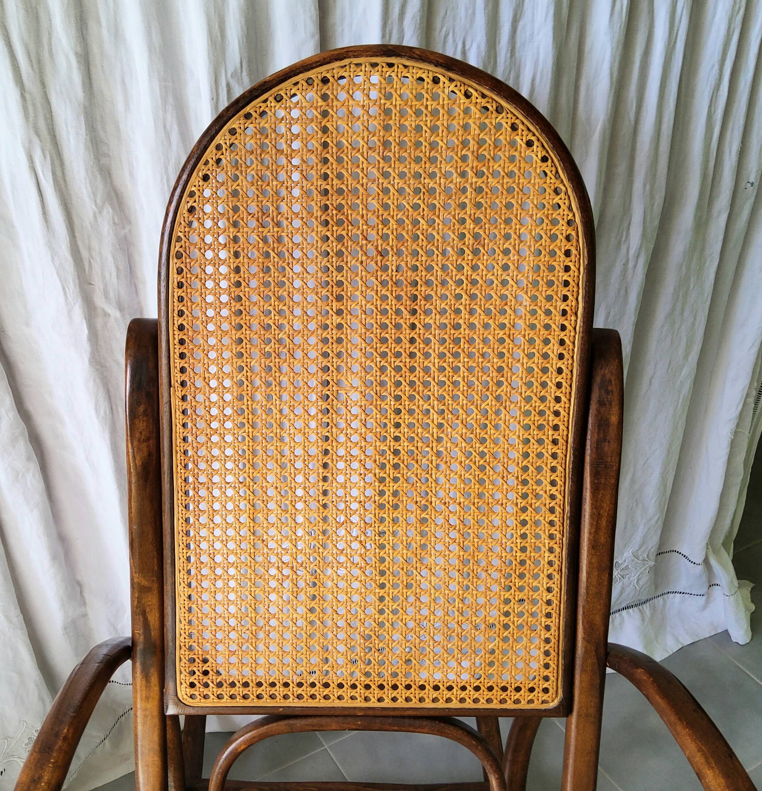Antique caned rocking chair