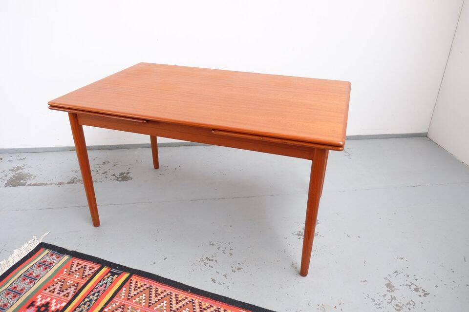Teak dining table in retro vintage Danish style from the 60s-70s.