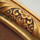 Cadre art nouveau ovale  en bois, décor flamé et  or