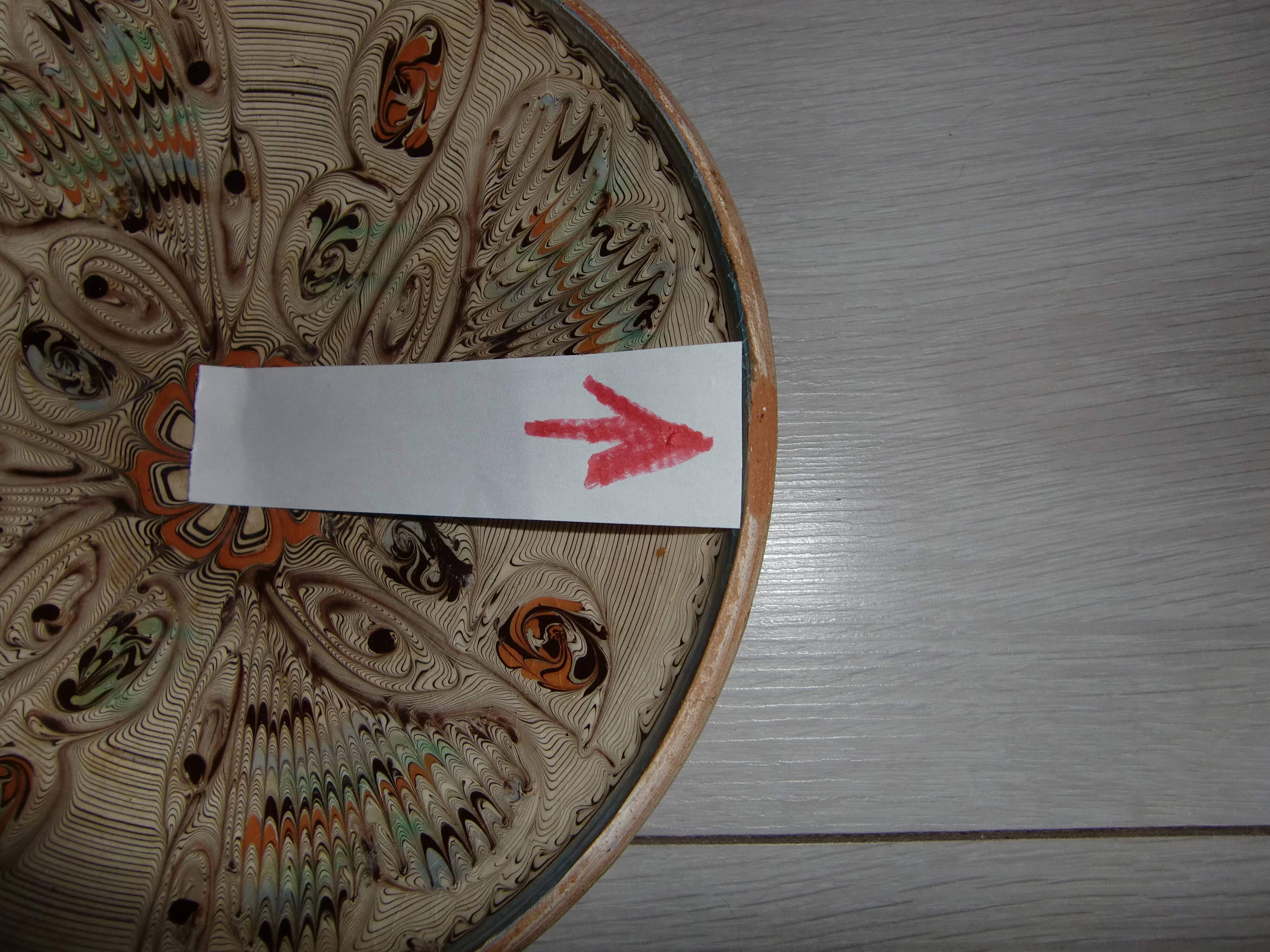 Hand decorated terracotta plate