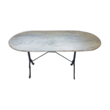 Table bistrot plateau ovale en marbre et cadre fonte