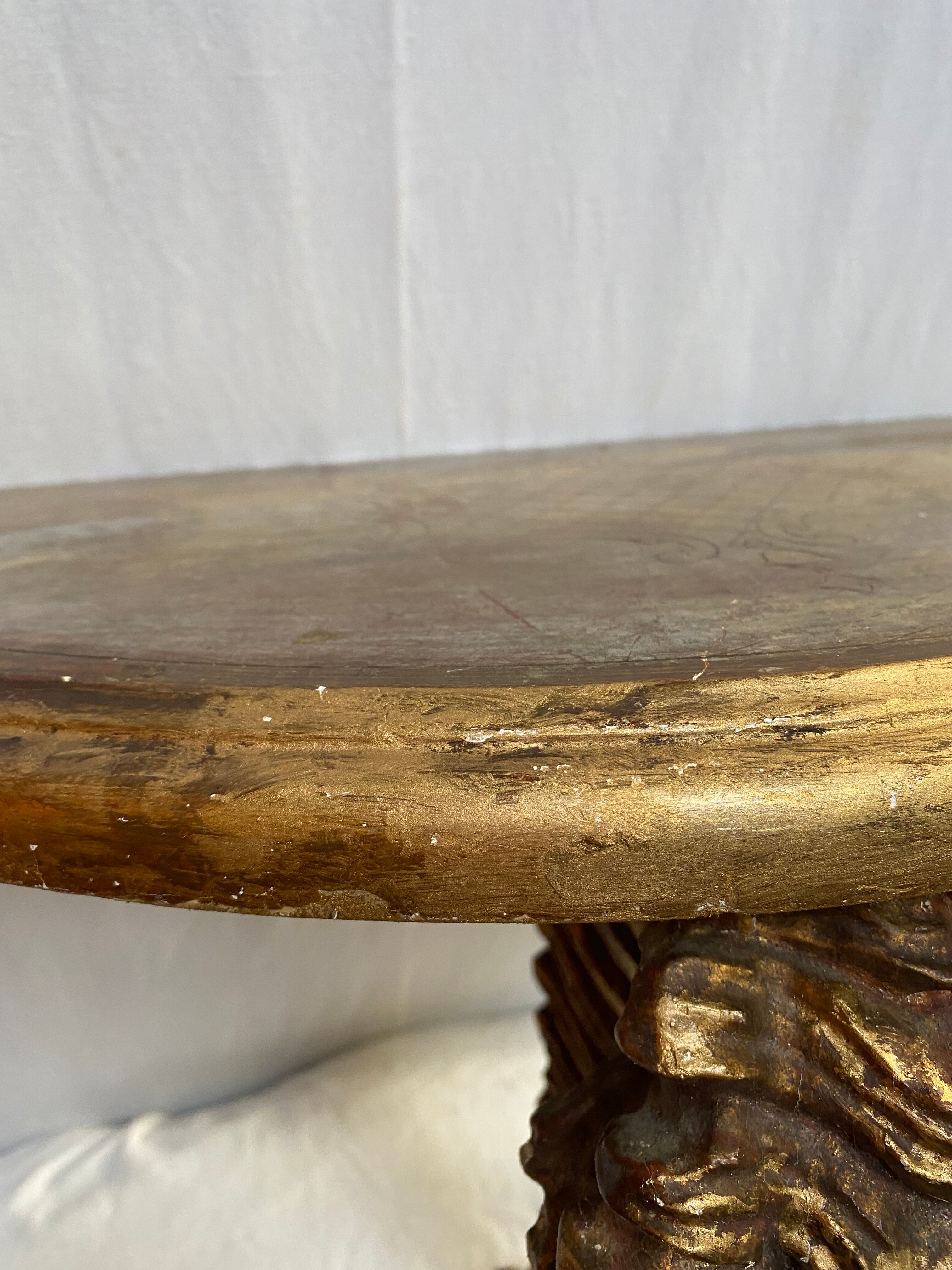 Wooden wall console and antique gilded stucco