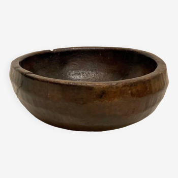 Old handcrafted bowl in African wood