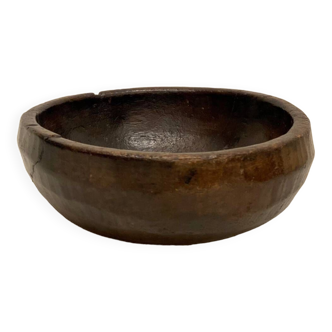 Old handcrafted bowl in African wood