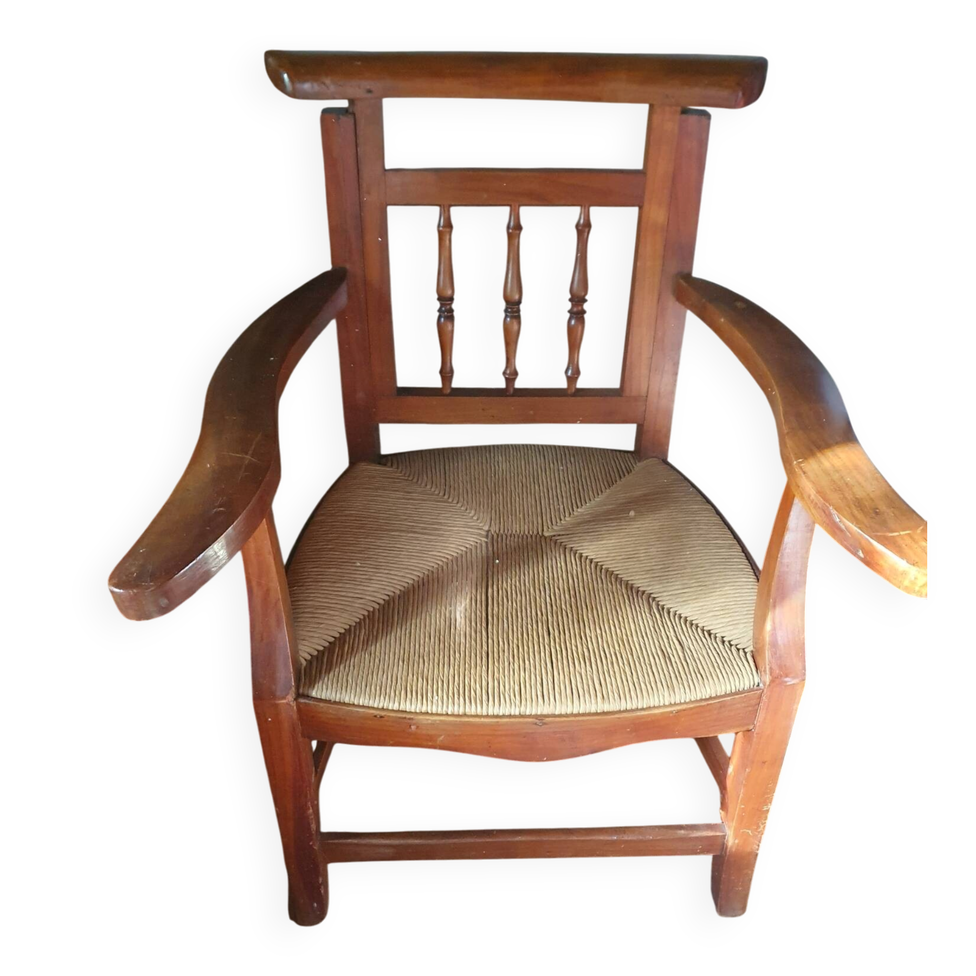 Beau fauteuil ancien au dossier haussable et assise en paille