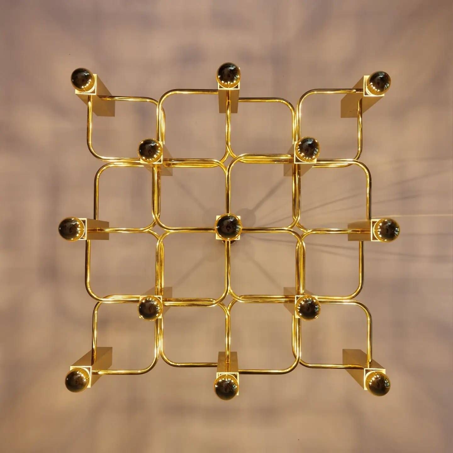 Geometric brass chandelier, design by Gaetano Sciolari, Boulanger, 1970.