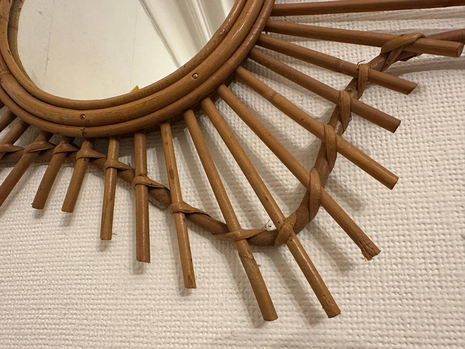 Vintage guitar-shaped rattan mirror
