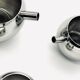 Stainless steel teapot, milk jug and sugar bowl