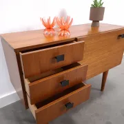 Vintage small teak cabinet with drawers, flap and black handles, hallway cabinet.