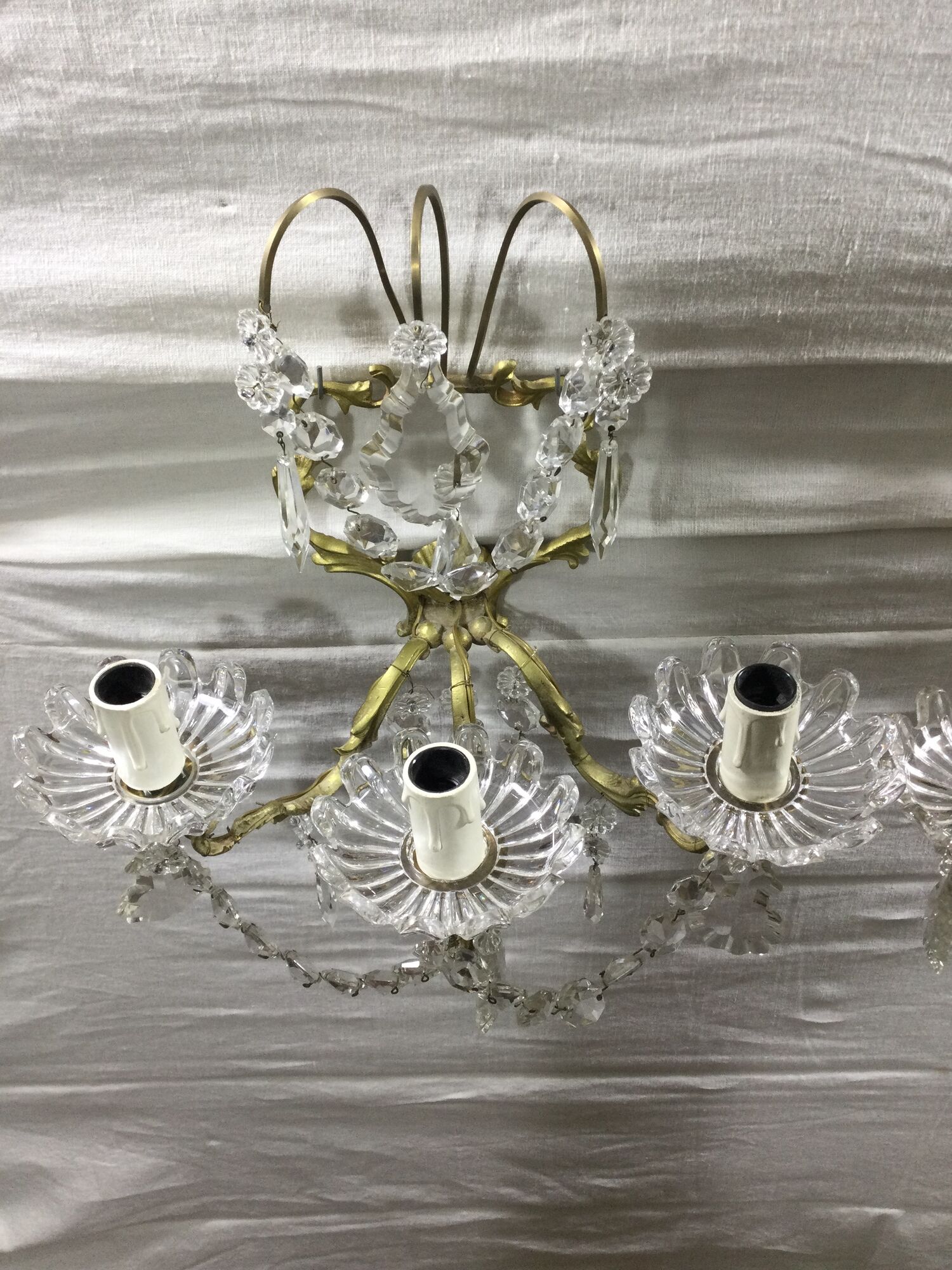 Pair of 3-light bronze and crystal wall lights