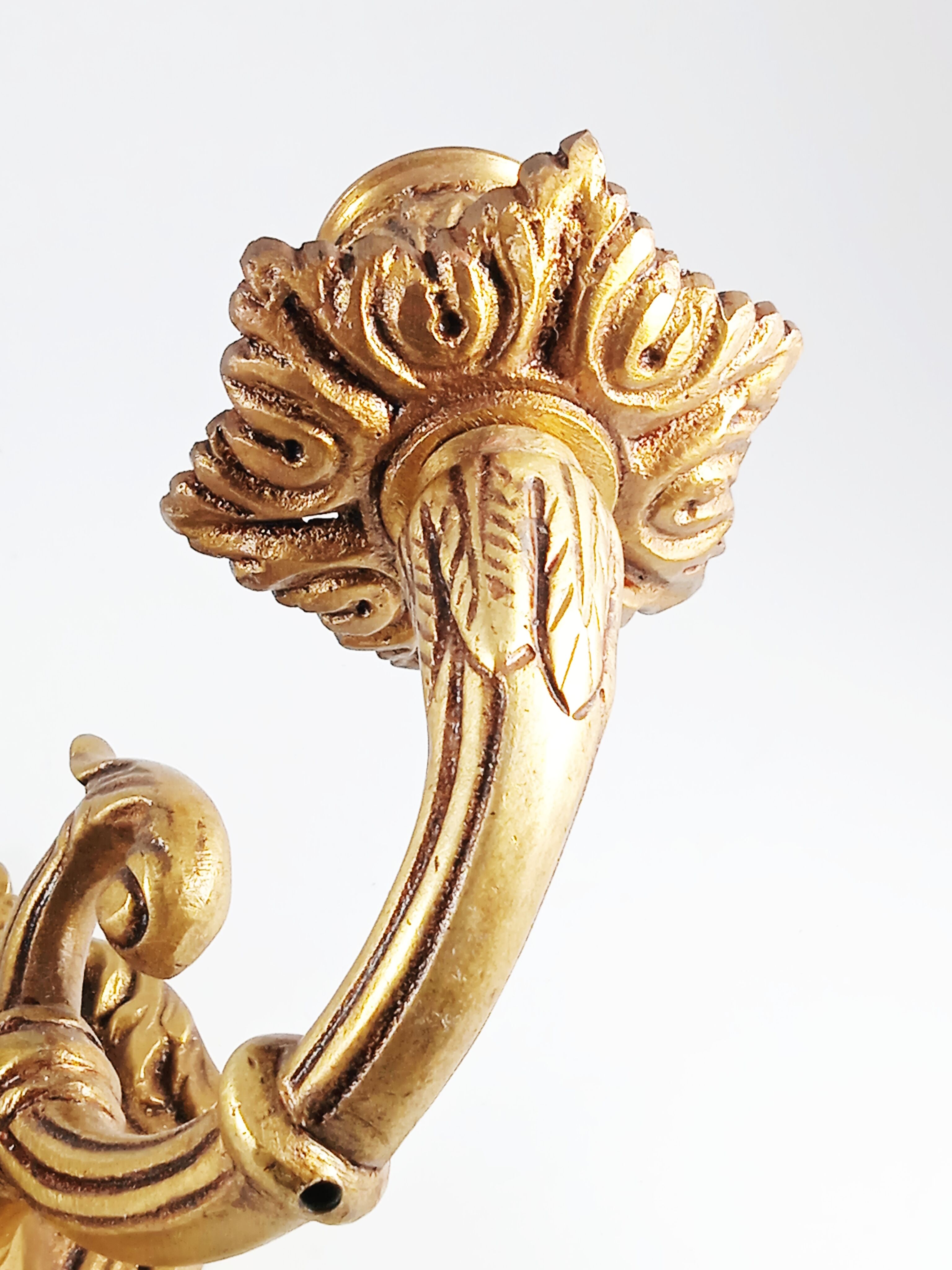 Set of 2 old candlestick sconces in bronze