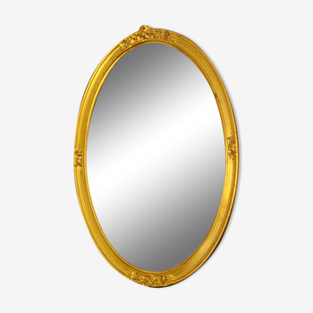 Miroir ovale bois doré à l'assiette rouge 44x66cm
