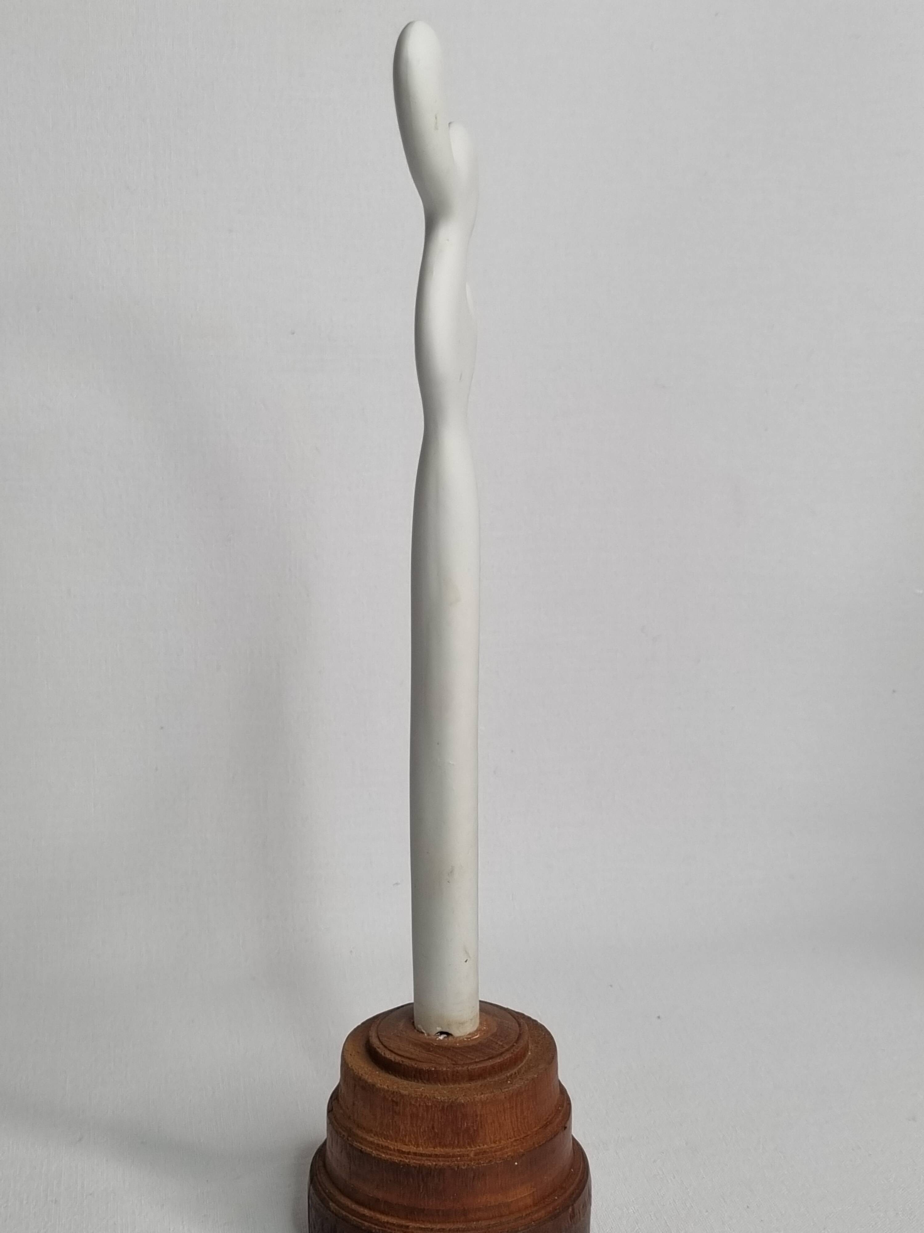 Biomorphic-inspired sculpture, on an industrial wooden base, 28 cm