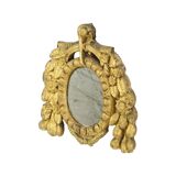 Petit miroir ancien patiné en bois doré du XIXe siècle