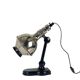 Directional articulated lamp in nickel-plated chrome and black bakelite, with cast iron counterweight.