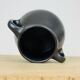 Black ceramic vase from the 1950s.