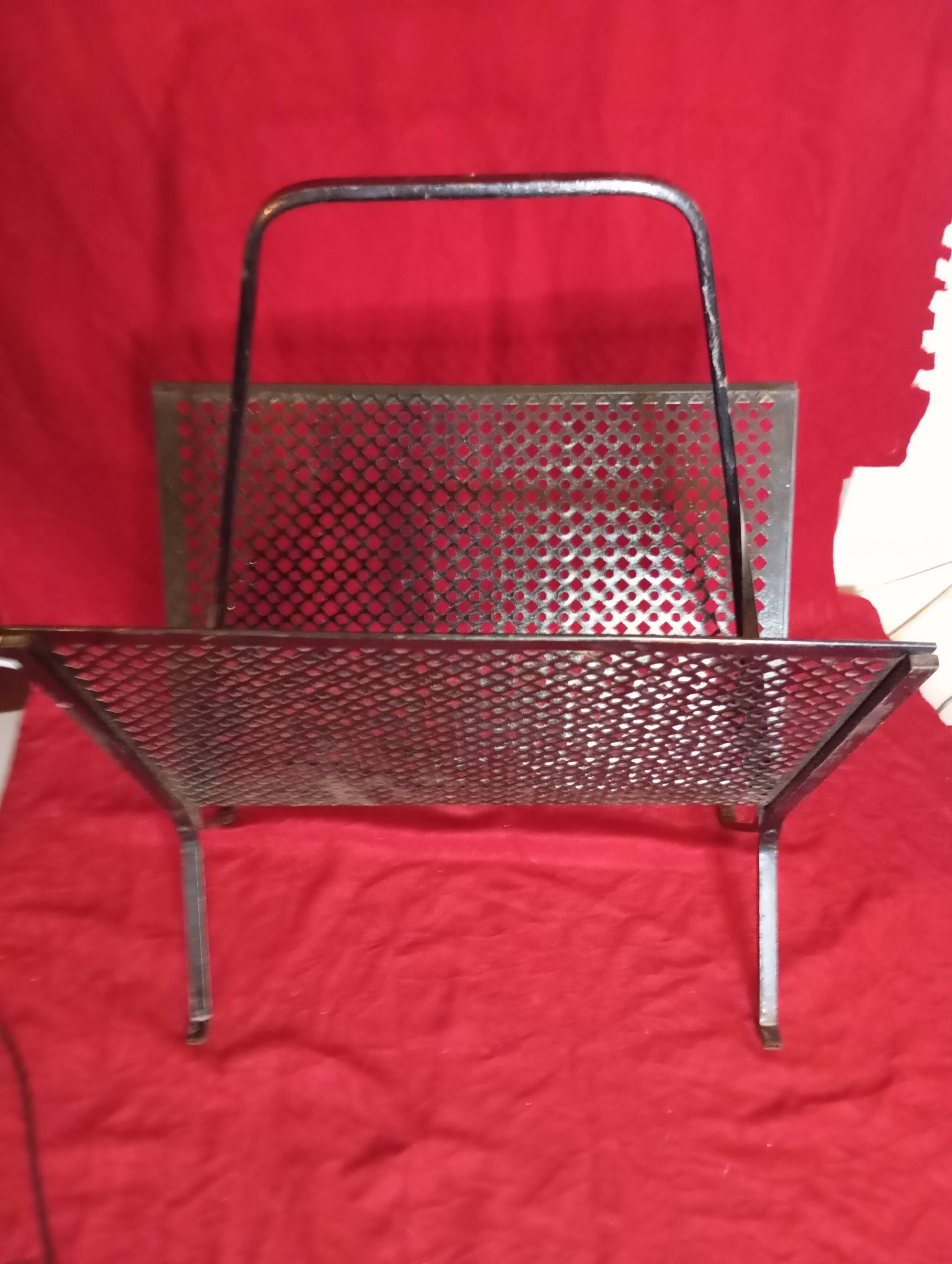 Vintage wrought iron magazine rack