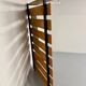Scandinavian design teak wall unit with entrance door from the 70s