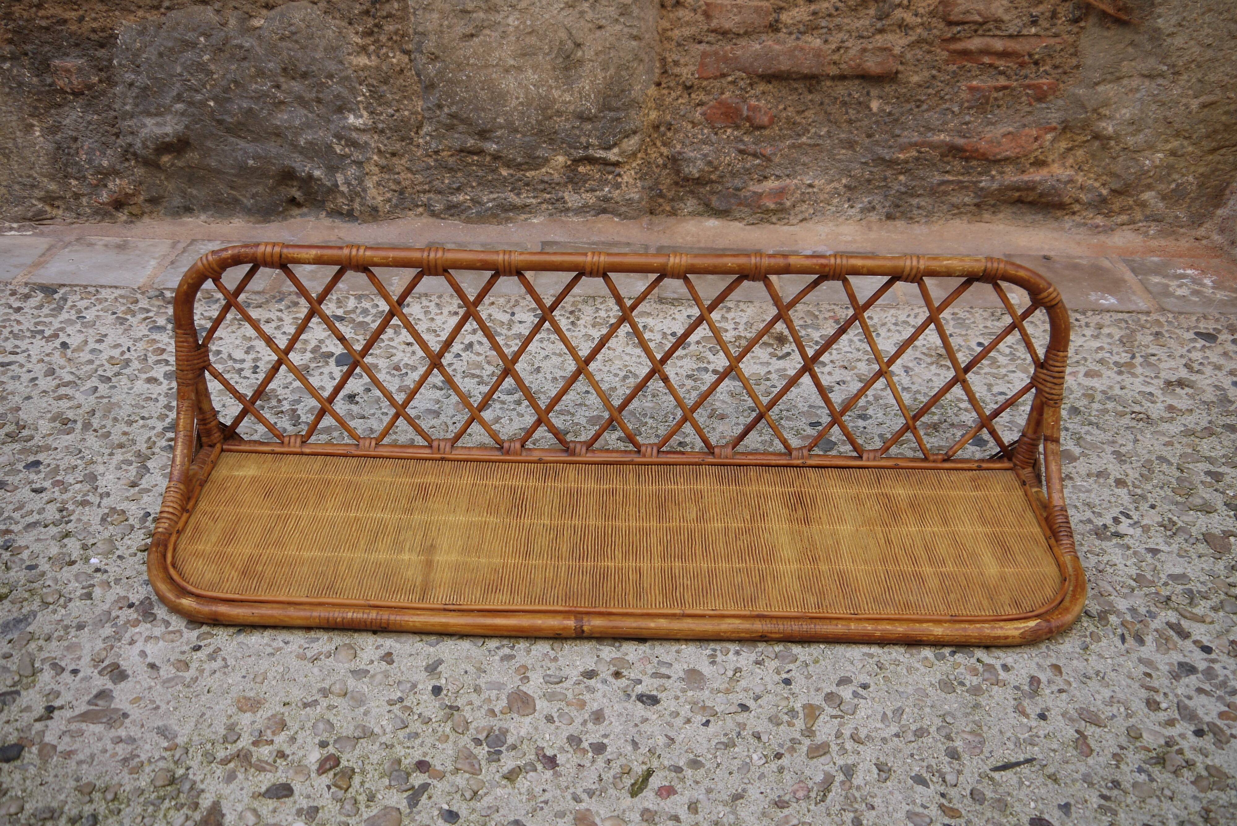 Rattan wall shelf