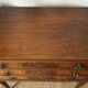 Solid walnut chest of drawers from the early 20th century.
