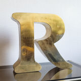 Old sign letter R