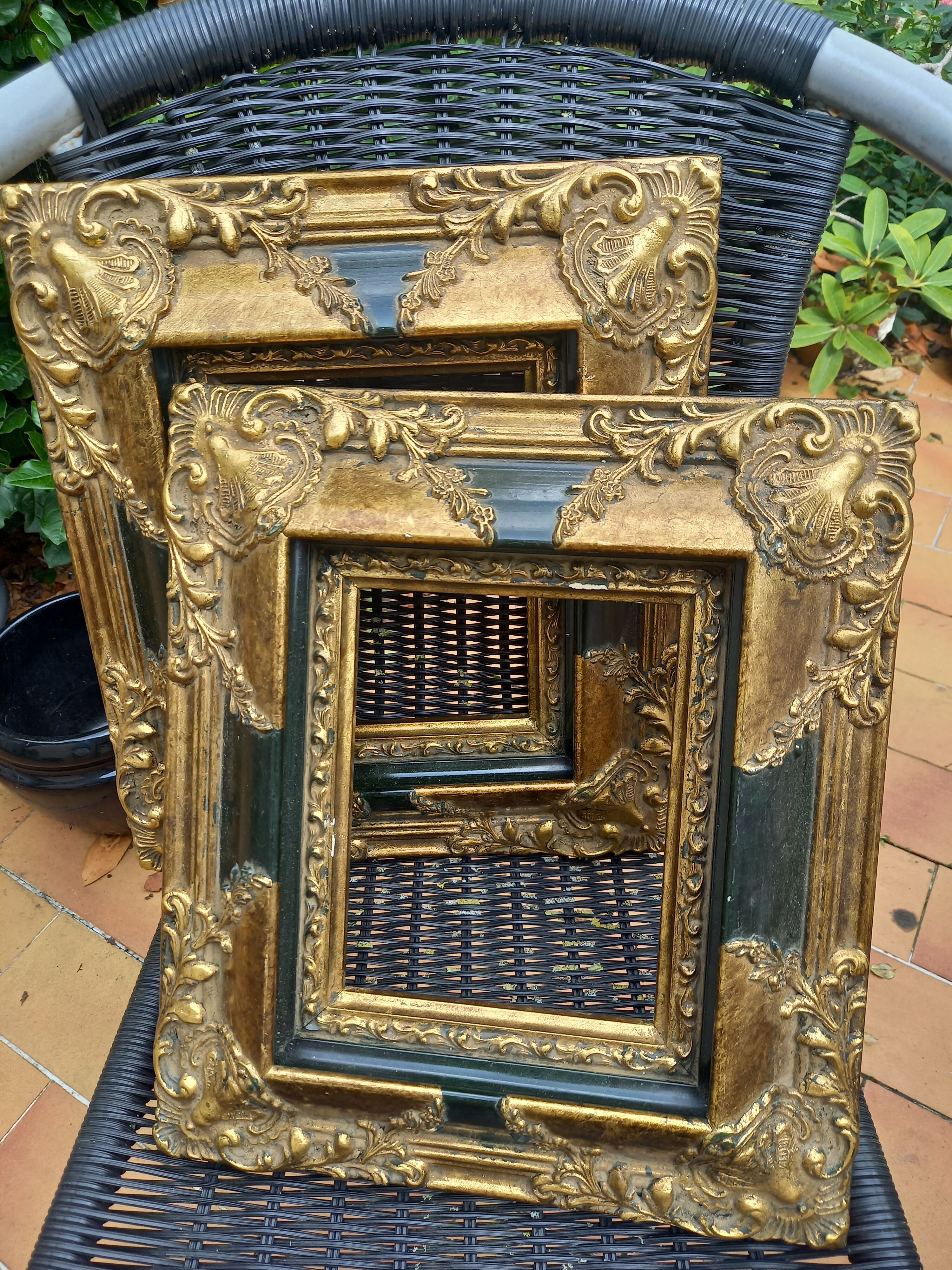 Pair of baroque frames in vintage gilded wood
