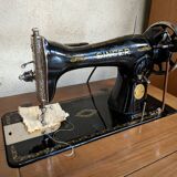 Singer sewing machine in its cabinet