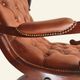 Rocking chair with footrest, wood and tufted leather