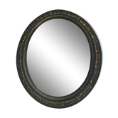 Miroir ovale Napoléon III laqué noir et doré
