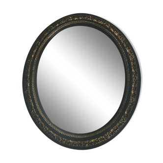Oval mirror Napoleon III lacquered black and gold