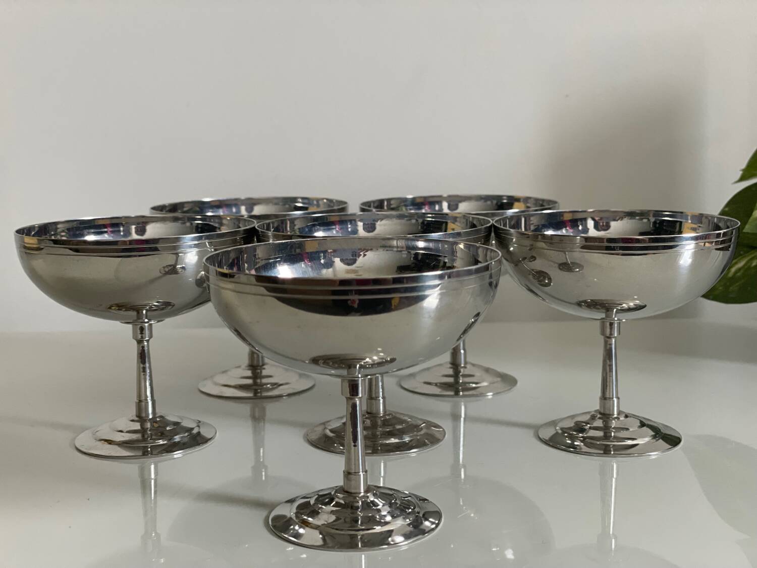 Six Guy Degrenne stainless steel ice cream cups.