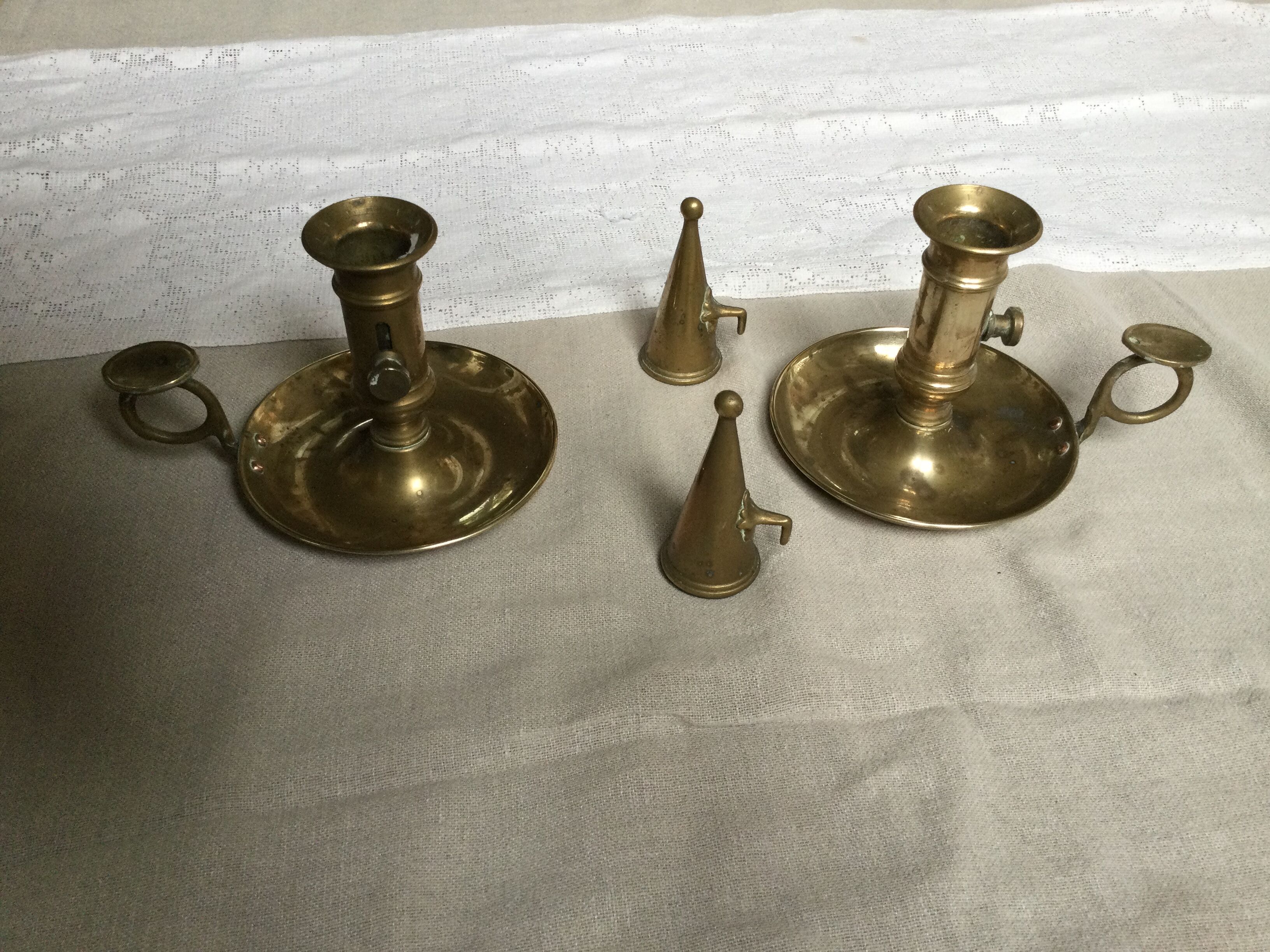 Pair of antique copper candle holders