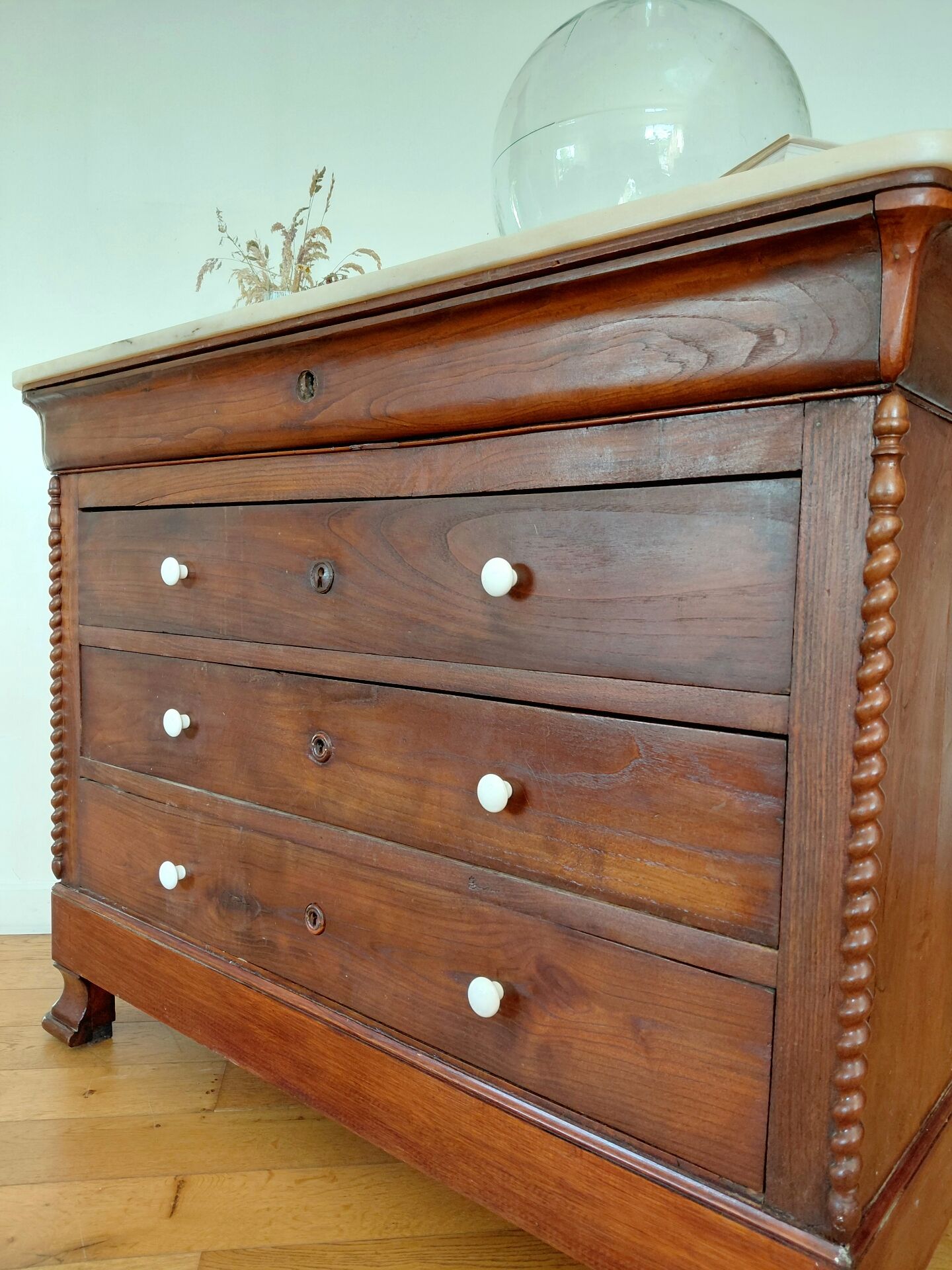 Louis-Philippe XIX walnut commode, twisted columns and marble.