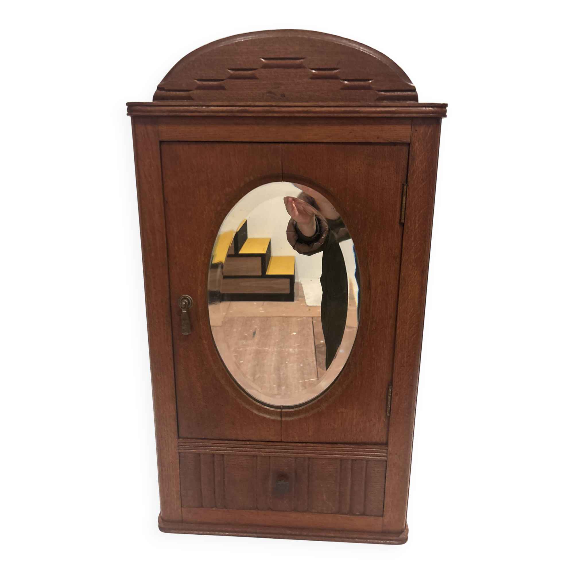 Wall cabinet with oval wall and drawer