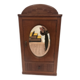 Wall cabinet with oval wall and drawer
